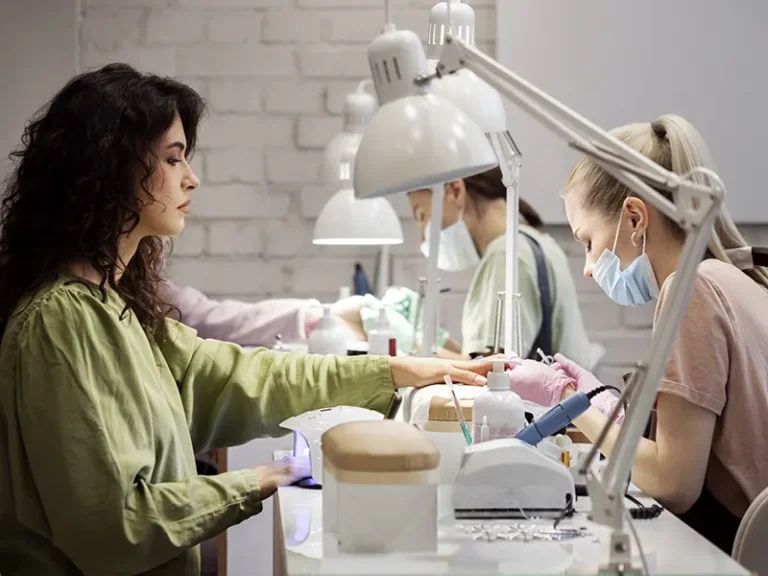 nail art professional working client nail salon